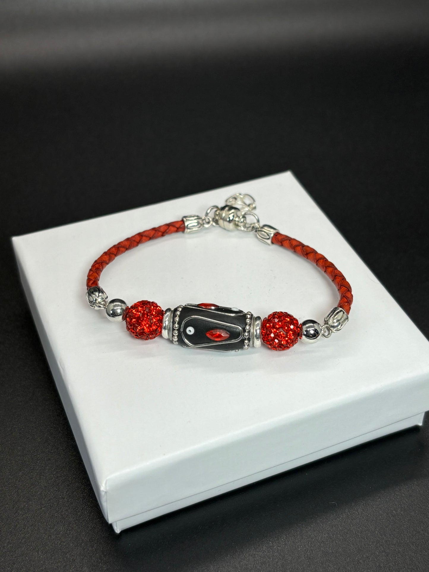 BR-0068 Red Bracelet with Black and Red Clay Beads, Red Leather Straps and a Magnet Closure