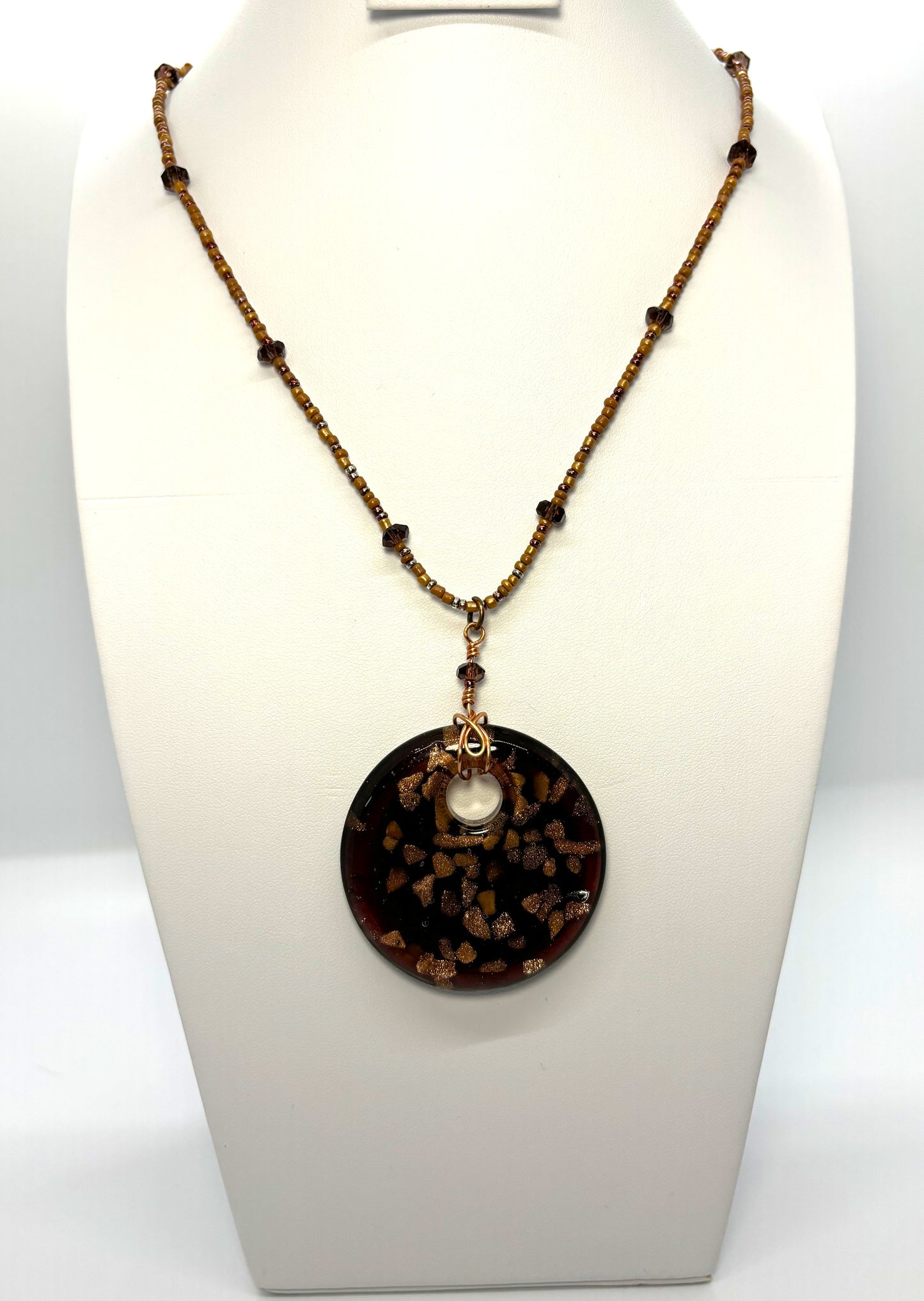 NE-0072 Unique Plum-colored Glass Pendant with Copper Flecks Mounted on a Beaded Necklace