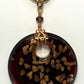 NE-0072 Unique Plum-colored Glass Pendant with Copper Flecks Mounted on a Beaded Necklace