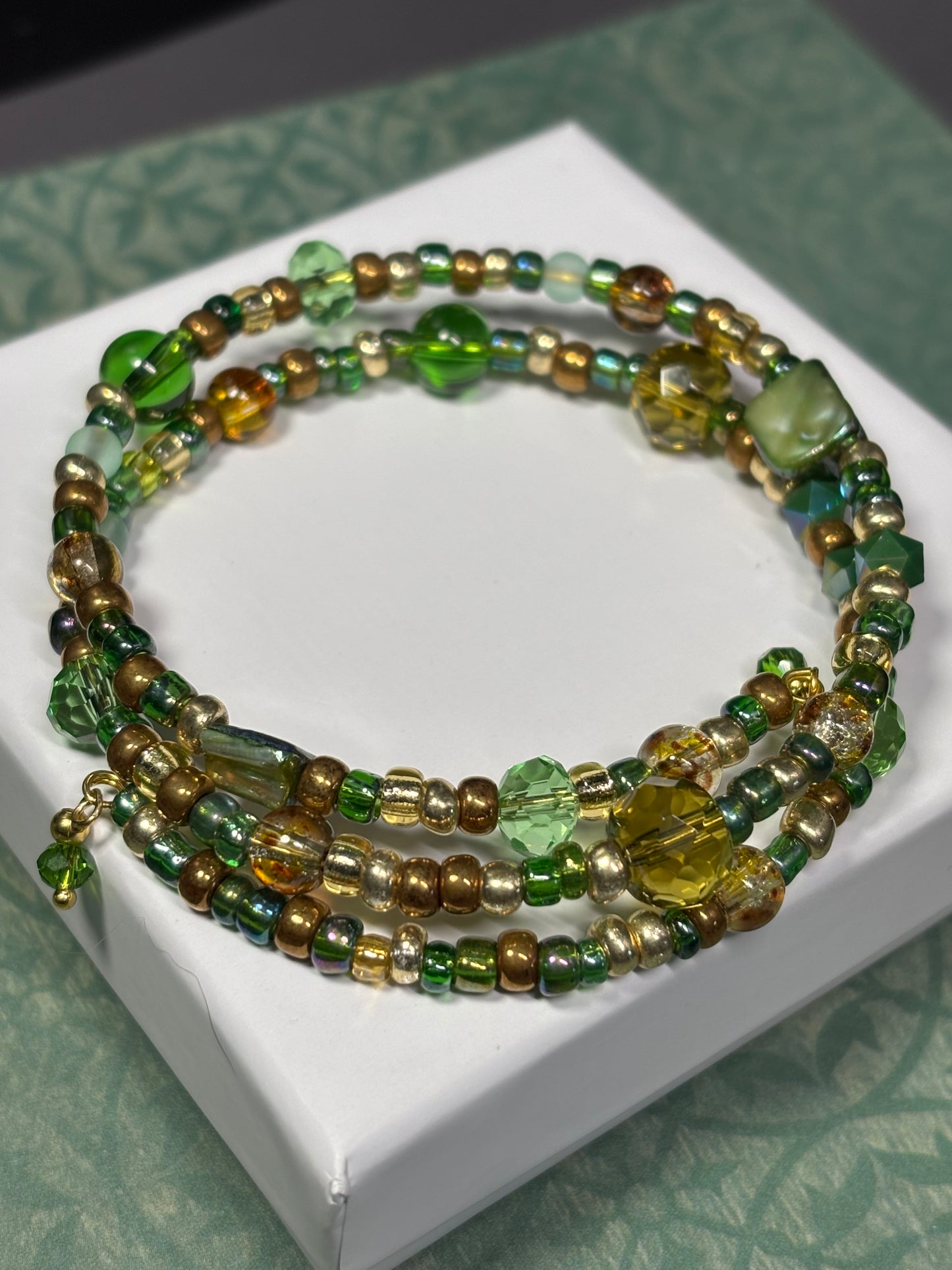 BR-0093 Green and Gold Medley of Beads in a Wrap Bracelet