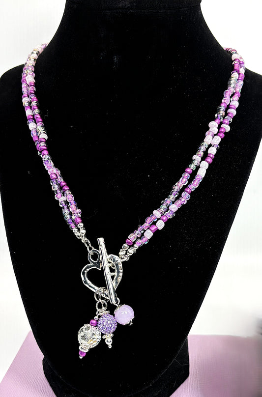 NE-0062 Lovely Silver Heart Toggle Necklace with Captivating Medley of Purple Beads