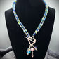 NE-0062 Lovely Silver Heart Toggle Necklace with Captivating Medley of Purple Beads